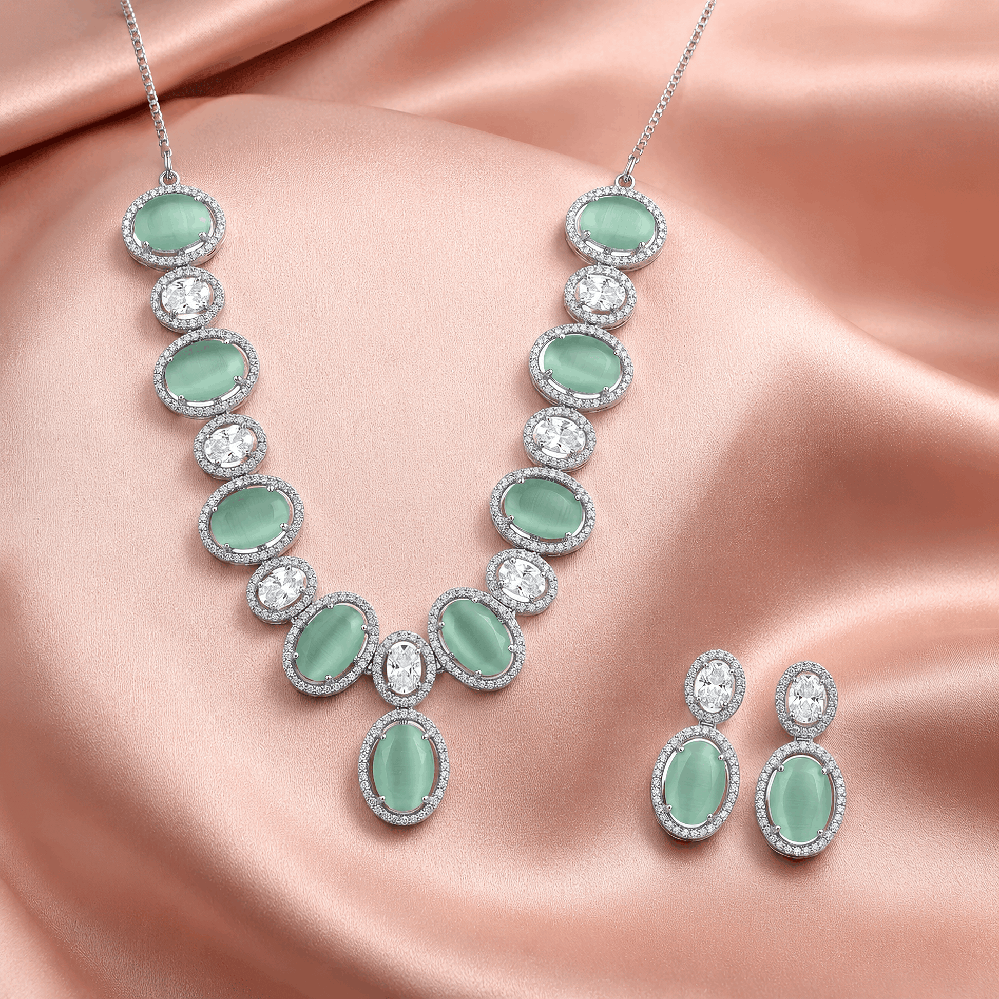 Anti tarnish rhodium finish regal choker set with alternating mint green gems