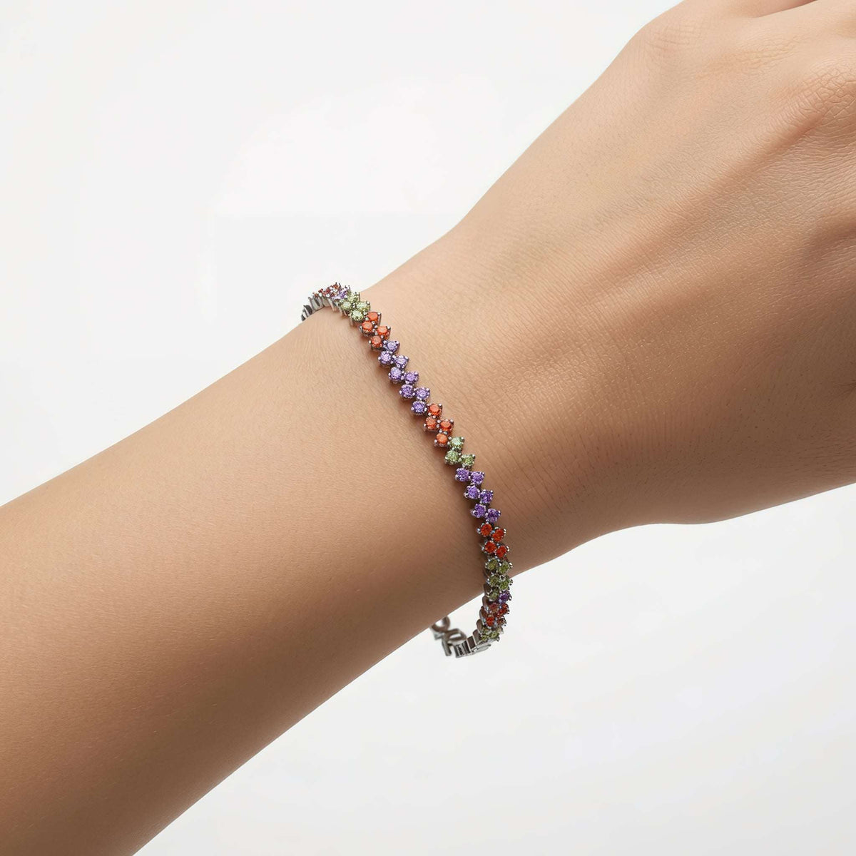 Anti-tarnish rhodium-finish bracelet with pastel purple and green stones