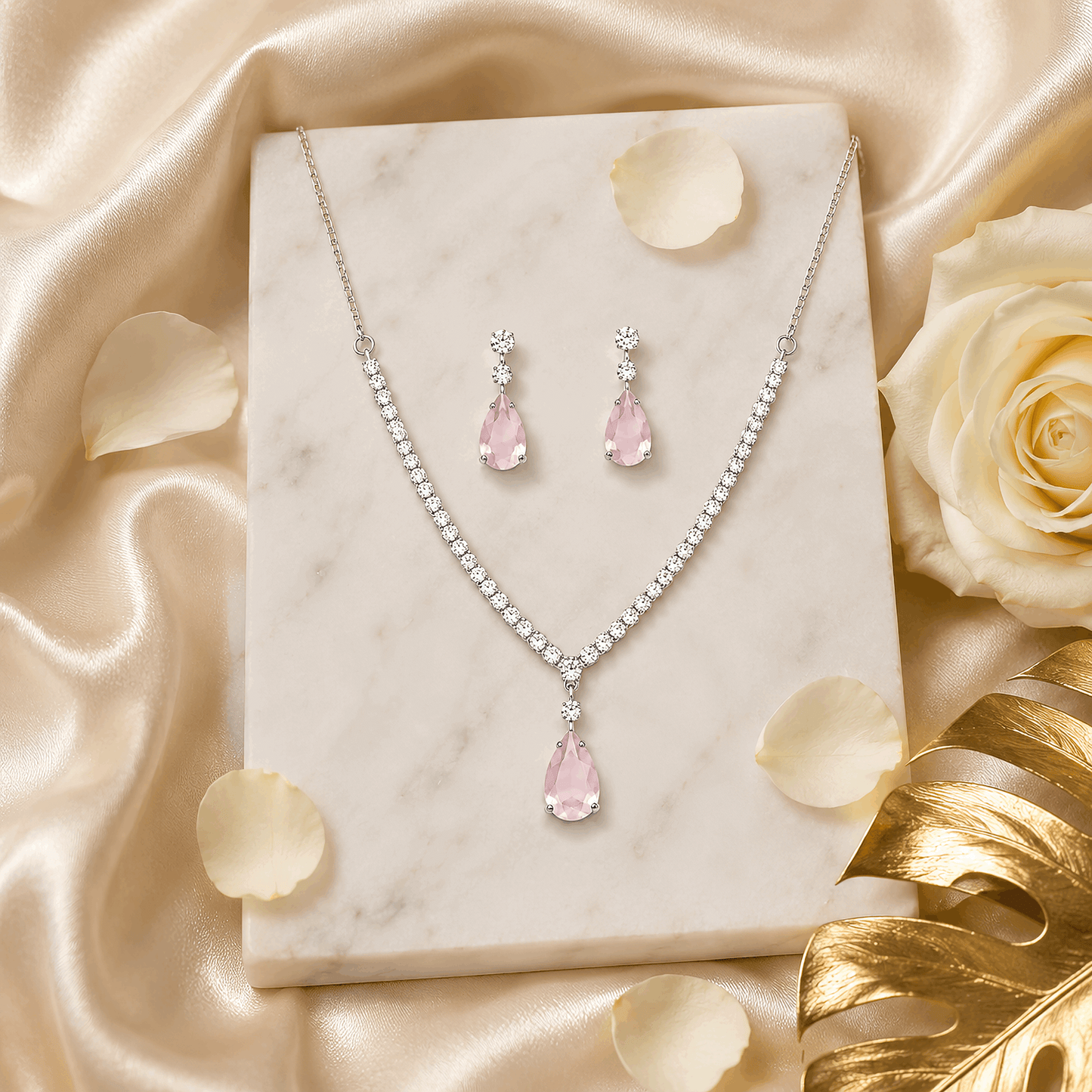 Anti tarnish rhodium finish demi fine jewelry set with translucent pink drops