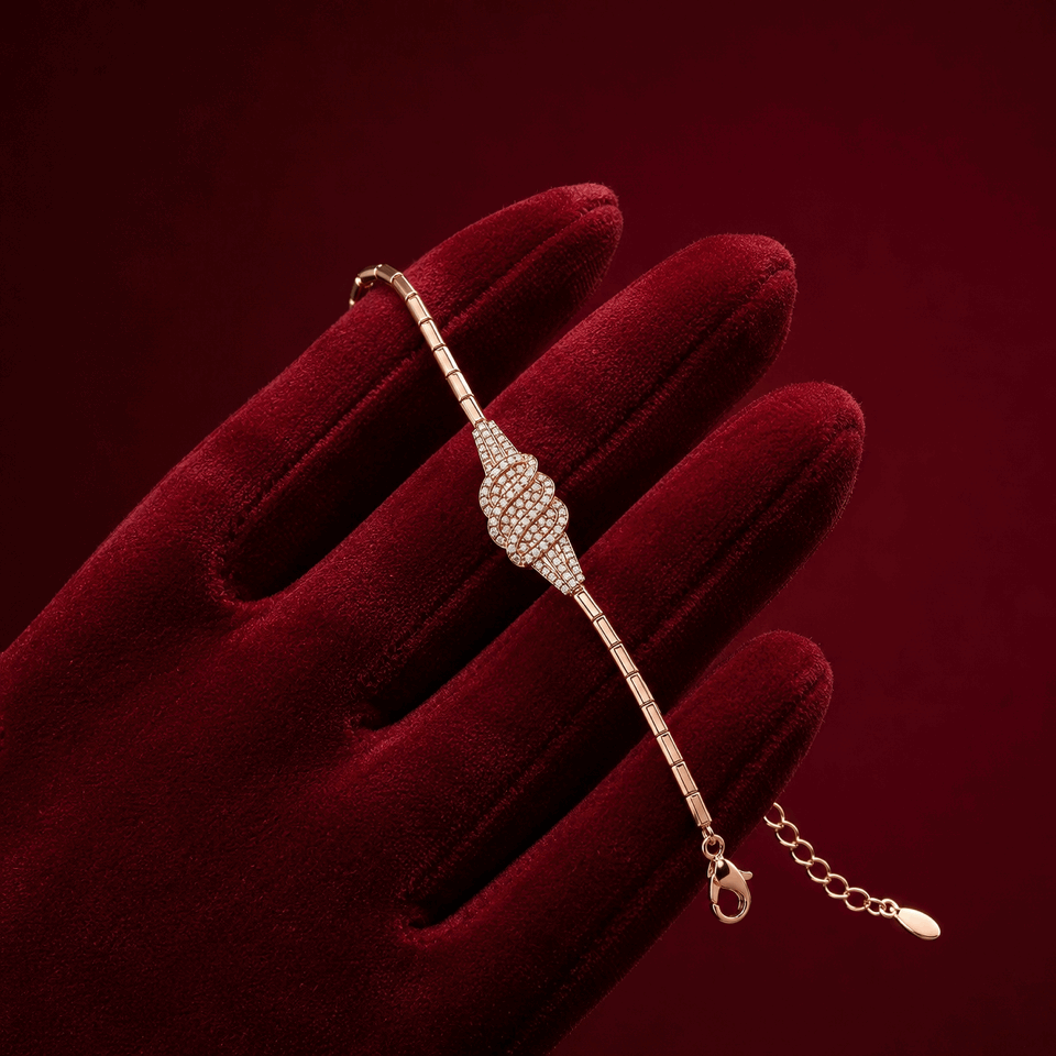 Elegant minimal bar link chain bracelet featuring interlocking pave swirls